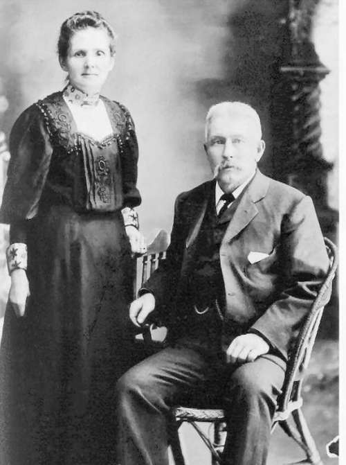 Roy Raymond's parents, Caroline and John Raymond, c. 1907